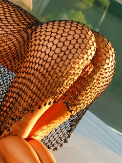 Mango A aka Katya Clover Posing in Sexy Fishnet Dress Outdoors