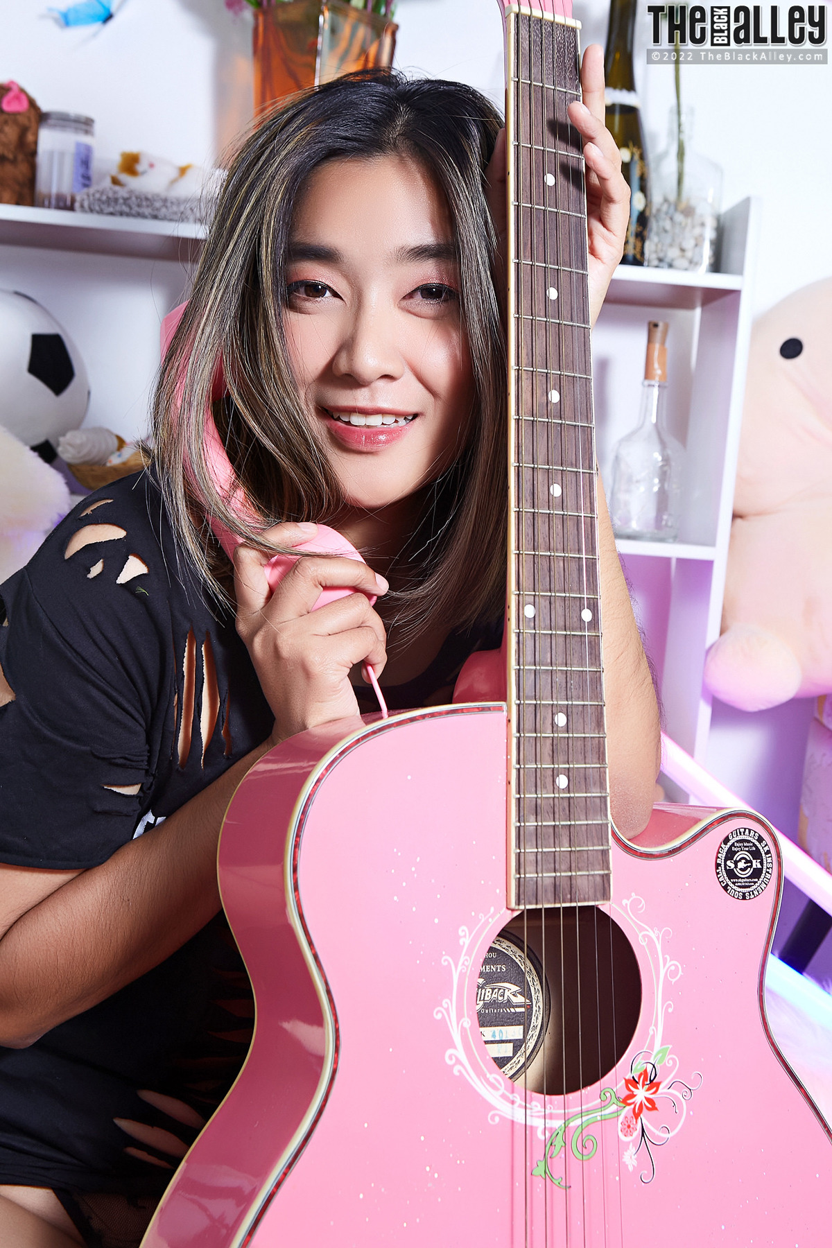 Asian Chick with her Pink Guitar - picture 02