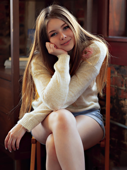 Young Brunette Kitten Lana Lea in Denim Shorts and White Sweater