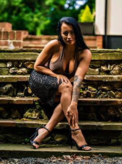 British Model Kelli Smith Holds her Big Tits Well on Patio Steps